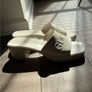 Gucci Cream Platform Slide Mules with Embossed Logo